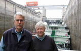 Craig and Janet Swan of Minneapolis on deck as Victoria Cruises' Victoria Jenna passes through the five-level ship lock at the Three Gorges Dam at Sandouping, China.