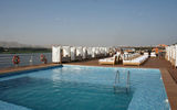 The sun deck on the River Tosca with Nile scenery floating by.