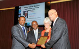 The Caribbean Tourism Organization presented an award to Travel Weekly Caribbean Editor Gay Nagle Myers for the best feature in a trade publication in 2012 for her report on St. Kitts and Nevis; from left, Nevis Tourism Minister Mark Brantley, CTO Secretary General Hugh Riley, Myers and St. Kitts Tourism Minister Ricky Skerritt.