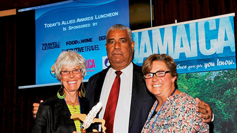 Caribbean Editor Gay Nagle Myers received the Jamaica Tourist Board’s Marcia Vickery Wallace Memorial Award for excellence in travel journalism. Pictured with Myers, left, are board Director John Lynch and Kate Wallace Rogers, Wallace’s daughter.