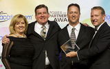 Also honored at the Vacation.com conference were Steve Muraca and Chad Burt of Cruise and Tours Unlimited, second and third from left, who received their 2013 President’s Award for U.S. Large Agency from Viera and Lovell.