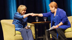 Former Secretary of State Hillary Clinton, left, and Greater Fort Lauderdale Convention & Visitors Bureau President Nicki Grossman share a fist bump at the recent ASTA Global Conference in Miami during a Q&A session conducted by Grossman. In her closing session speech, Clinton praised travel agents, calling them “dream makers,” and talked about the importance of travel in bringing cultures and people together to improve global understanding.