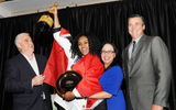 Caribbean Junior Chef of the Year Naomi Lovell, Trinidad and Tobago team, celebrated her award with, from left, Richard Doumeng, president, CHTA; Vanessa Ledesma, director of operations and events, CHTA; and head judge Peter Olsacher, director of research and development for Bahama Breeze Island Grill restaurant chain in the U.S.