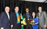 Jamaica’s Brian Lumley, center, was named Caribbean Chef of the Year at last month’s Taste of the Caribbean 2013 culinary competitions. The event was sponsored by the Caribbean Hotel & Tourism Association (CHTA) and was held in Miami. Joining Lumley at the award presentation are, from left, Richard Doumeng, president, CHTA; chef John Buck, PRG Solutions; Vanessa Ledesma, director of operations and events, CHTA; and head judge Peter Olsacher, director of research and development for the Bahama Breeze Island Grill restaurant chain in the U.S.