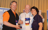 Todd Stallbaumer, left, consumer and trade marketing director for the Oklahoma Tourism & Recreation Department, was presented with Travel Alliance Partner’s  2013 Spirit of TAP Award. The award was established in 2012 in memory of TAP Partner Ann Thomas of Western Discovery to recognize a supplier who embodies the true Spirit of the Travel Alliance Partners. Joining Stallbaumer at the awards presentation were Jim Coggin of the Virginia Beach Convention & Visitors Bureau, last year’s recipient, and Tracy Gruber, Ann Thomas’ daughter.