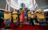 The Hicks family of St. Petersburg is greeted by Russ Dagon (in yellow shirt), vice president and executive project director at Universal Creative, and the “Despicable Me” Minions at the opening of Universal’s Cabana Bay Beach Resort in Orlando on March 31. They were the first guests to check in at the retro-inspired hotel, whose amenities include a 10,000-square-foot pool with tower waterslide and a 10-lane bowling alley.