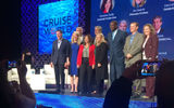 Audience members headed to the stage to snap their own photos of the cruise-president panelists. From left: Moderator Arnie Weissmann, Jan Swartz, Larry Pimentel, Christine Duffy, Rick Sasso, Lisa Lutoff-Perlo, Orlando Ashford, Jason Montague and moderator Mary Pat Sullivan.