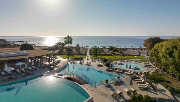 The resort is family friendly with a series of pools overlooking the sea.
