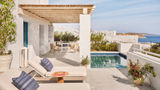 The resort's cliffside location provides panoramic views of the Aegean Sea. Shown here is a Premier Executive Suite.