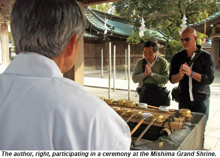 Ken participating in a ceremony at the Mishima Grand Shrine.