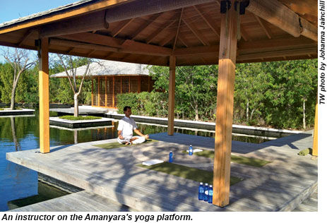 A yoga instructor at Amanyara
