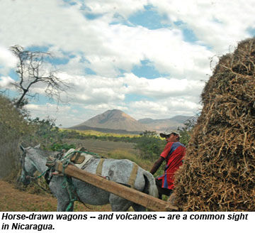 Horse-drawn wagons, volcanoes, common sights in Nicaragua.