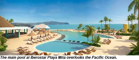 The main pool at Iberostar Playa Mita overlooks the Pacific Ocean.