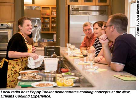 Poppy Tooker demonstrates cooking concepts at the New Orleans Cooking Experience.