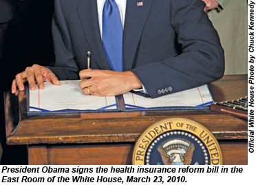 Obama signs health insurance reform bill