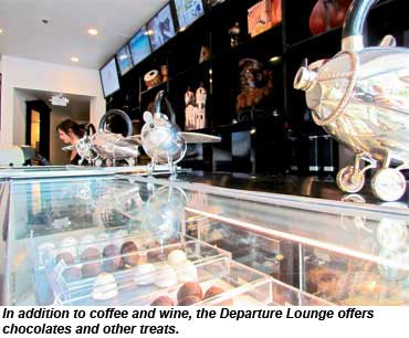 In addition to coffee and wine, the Departure Lounge offers chocolates and other treats.