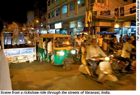 Scene from a rickshaw ride through Varanasi, India.