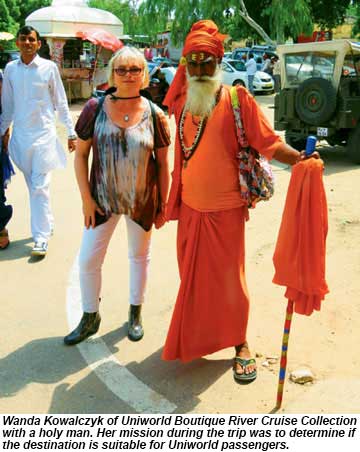 Uniworlds Wanda Kowalczyk with a holy man.