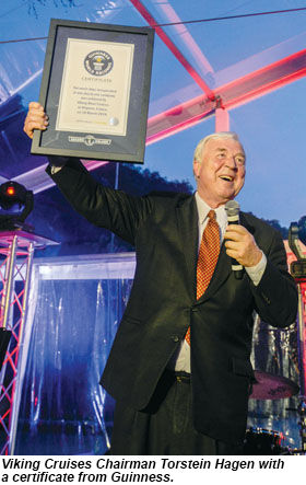 Viking Cruises Chairman Torstein Hagen with a certificate from Guinness.