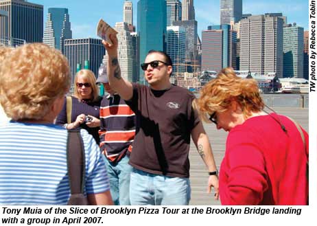 Tony Muia of the Slice of Brooklyn Pizza Tour at the Brooklyn Bridge landing with a group in April 2007.