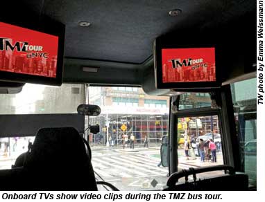 Onboard TVs show video clips during the TMZ bus tour.