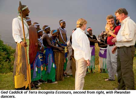 Ged Caddick of Terra Incognita Ecotours with Rwandan dancers.