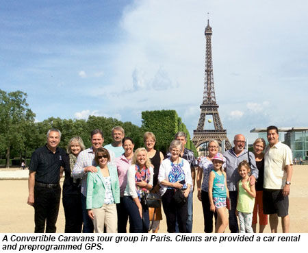 A Convertible Caravans tour group in Paris.