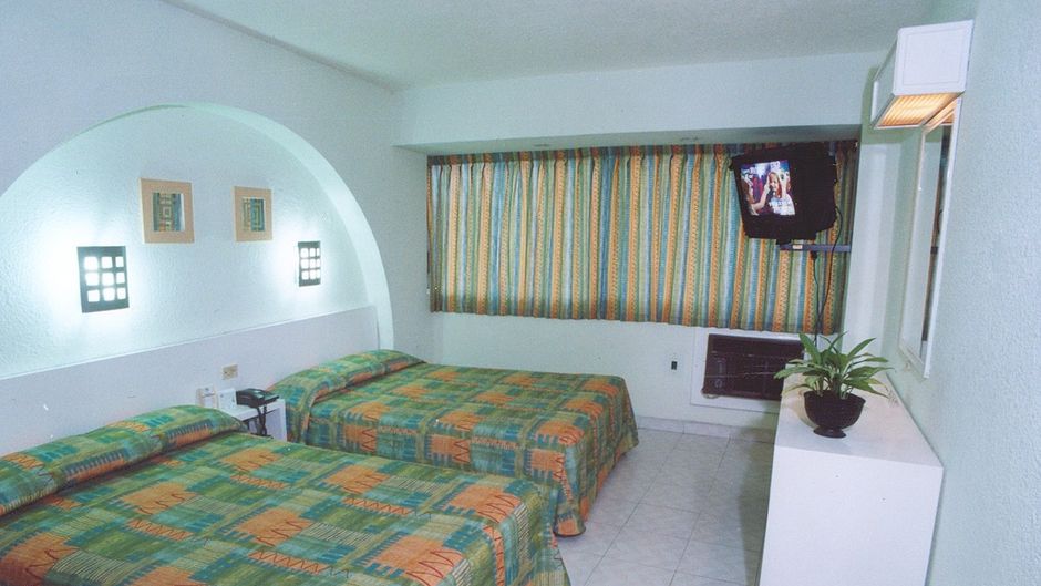 Caribe International Hotel Room