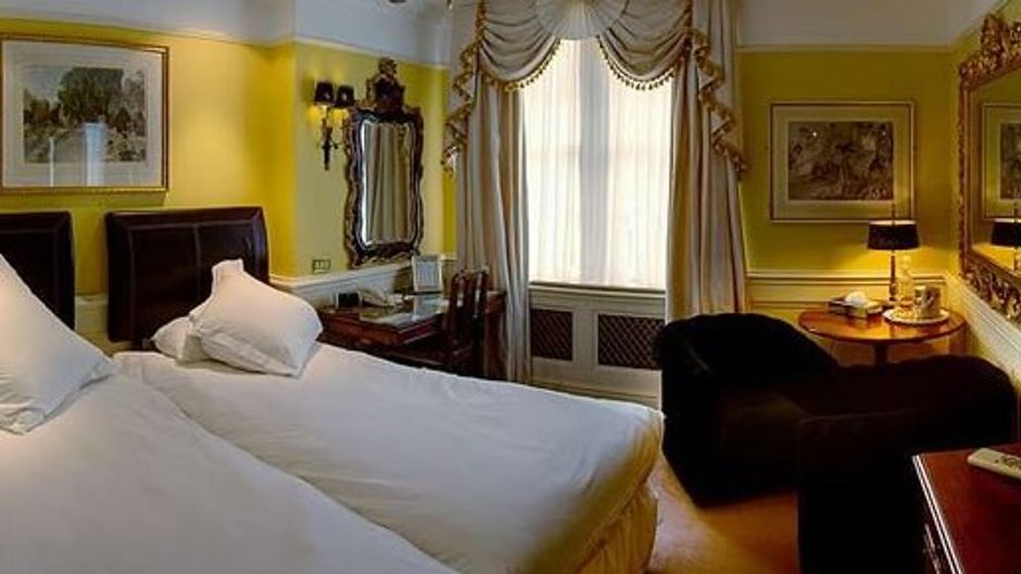 The Empire Hotel Room