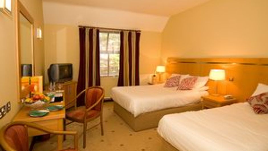 The Queens Hotel Room