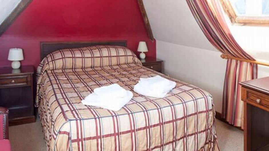 The Pilgrims Hotel Room