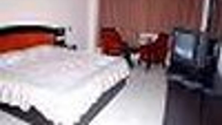 A New Delhi Orchid Garden Hotel Room