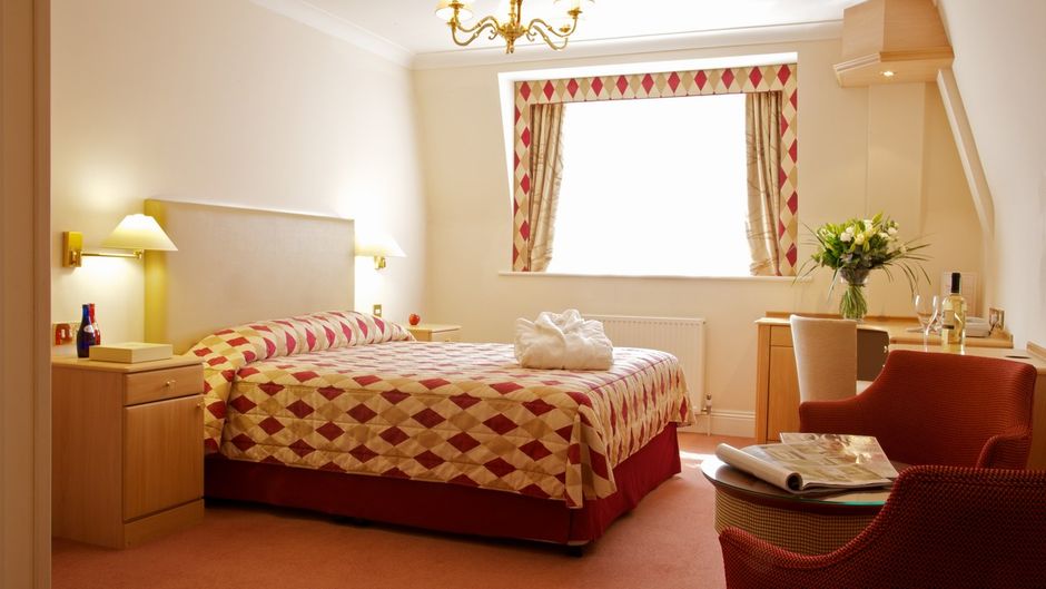 Walton Cottage Hotel & Suites Room