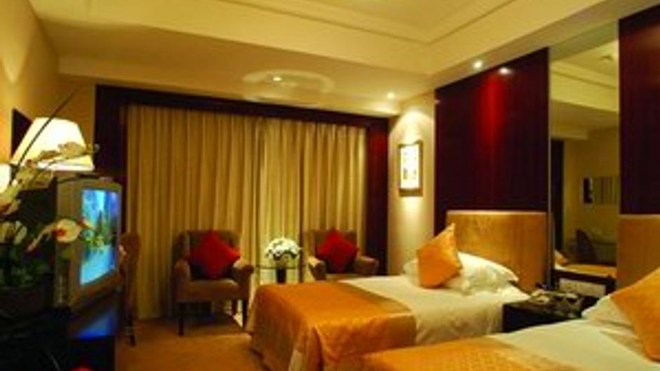 Huachen International Hotel Room