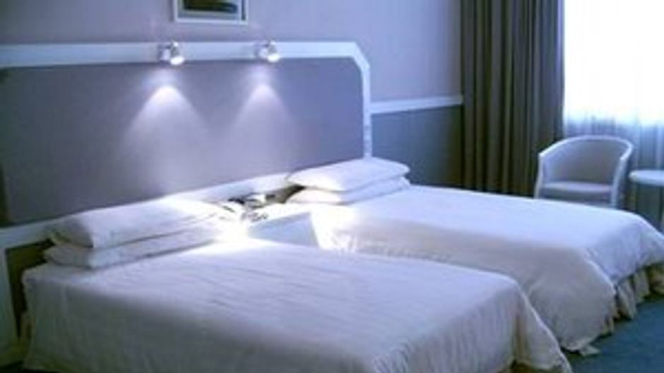 Hui Heng New Asia Hotel Room