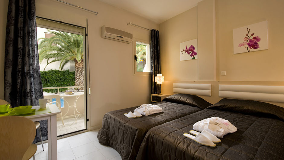 Axos Hotel Apartments Suite