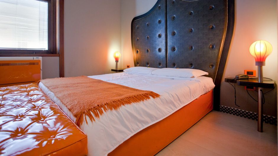 Orange Hotel Room