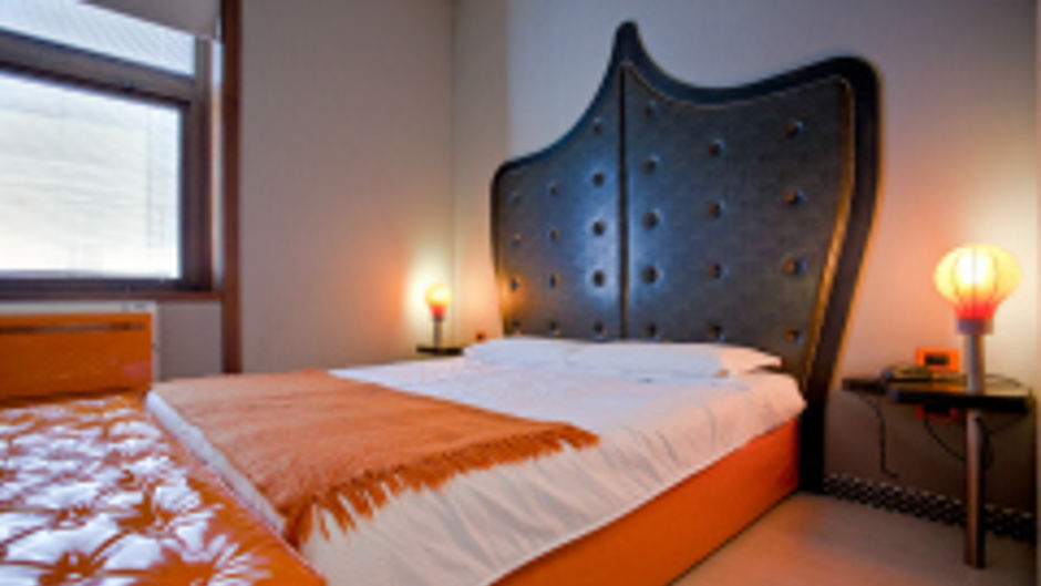 Orange Hotel Room