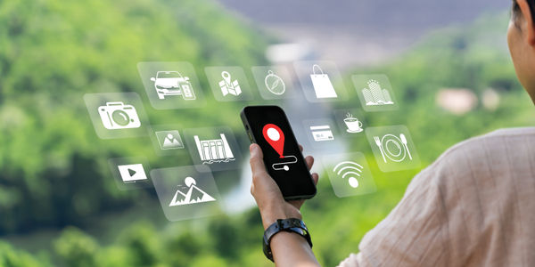 Asian Woman Using Smartphone, Searching Travel Destinations, Hotels, Restaurants and Car Rentals, Creating Travel Content with Internet Connectivity and Digital Tourism