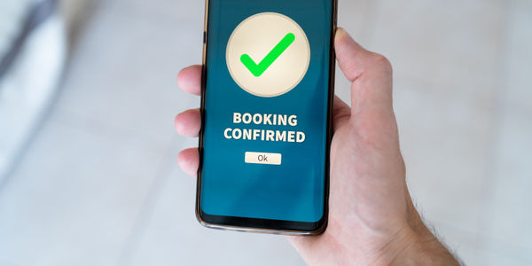 A Booking confirmed notification on smart phone.