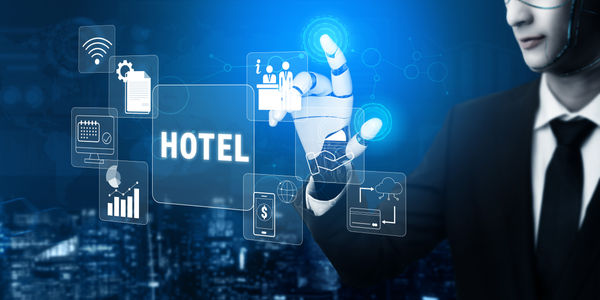 Businessman with futuristic technology interacting with hotel management interface, showcasing digital innovation and automation in hospitality industry Quark.