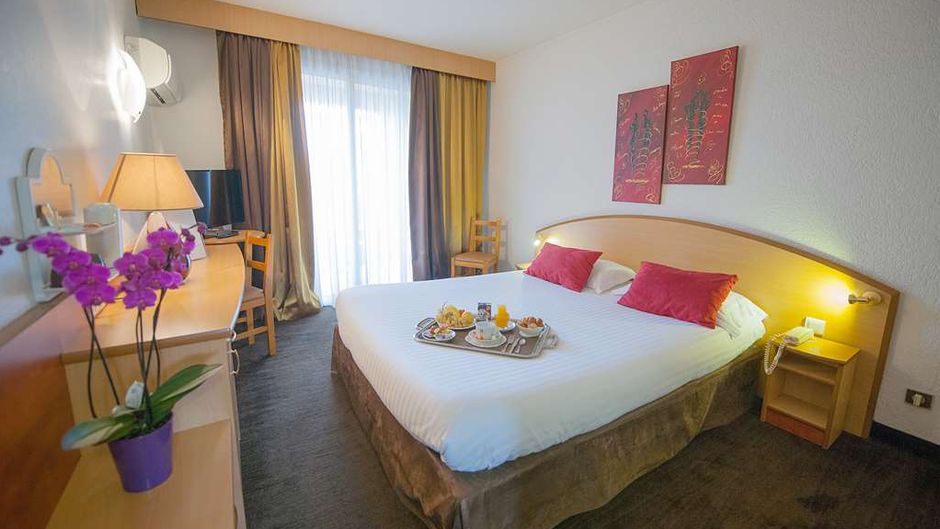 Promotel Hotel Room