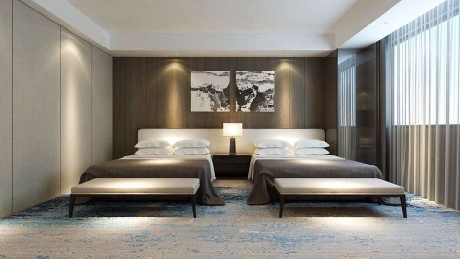 Queena Plaza Hotel Room
