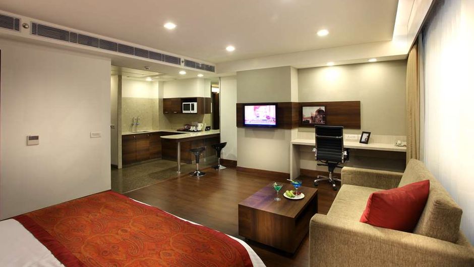 Mahagun Sarovar Portico Room