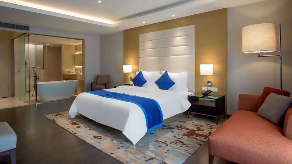 Feathers - A Radha Hotel Room
