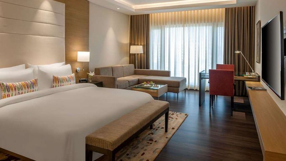 Feathers - A Radha Hotel Room