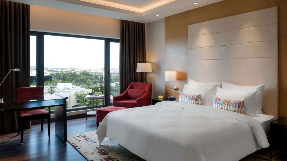 Feathers - A Radha Hotel Room