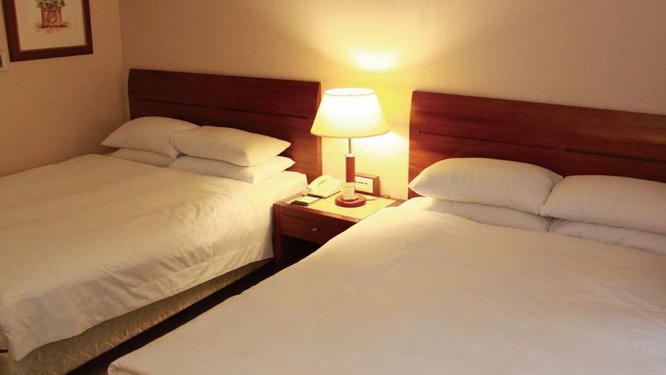 Monarch Plaza Hotel Room