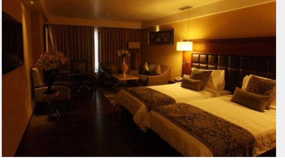 Paradigm Sarovar Portico Room