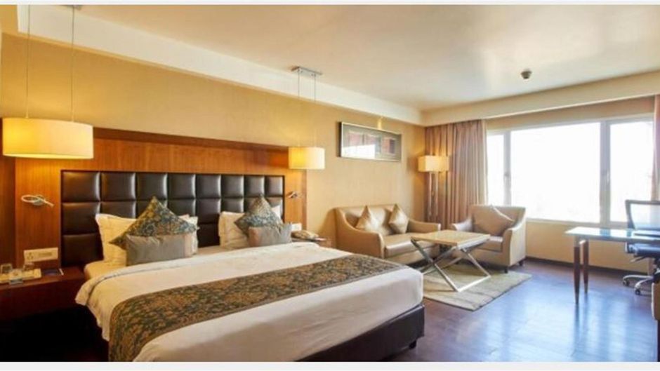 Paradigm Sarovar Portico Room